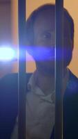A mysterious figure cautiously explores the dark, using a flashlight to light their path video