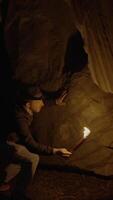 An Adventurer Engaging in Exploration of a Vast and Mysterious Cave System, Full of Wonders video