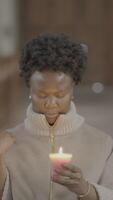 Contemplation in the soft glow of candlelight A serene moment dedicated to deep reflection video