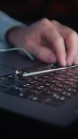 Closeup view of hands actively typing away on a laptops keyboard while they work video