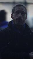 A Mysterious Figure in a Shadowy Background, evoking curiosity and a sense of enigma video