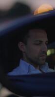 Contemplative Man in Car Reflection Understated Yet Profound in Meaning and Emotion video