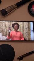 A Woman Demonstrating Beauty Products In An Engaging And Creative Manner For The Audience video