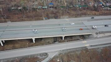 View from a drone of cars moving along a multi-lane highway video