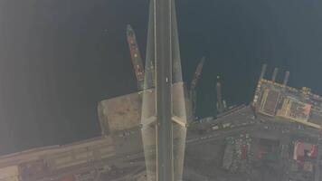 Drone view of the Golden Bridge and the city at dawn in heavy smog video