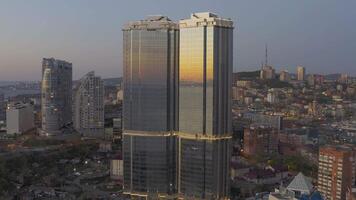 Drone view of a modern skyscraper located in the center of Vladivostok video