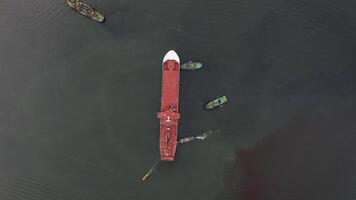 Tugs mooring the ferry that arrived at the port for completion at the shipyard video