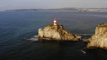 Drone view of the picturesque old Basargin lighthouse on the coast of the sea video