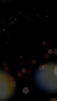This abstract art showcases a stunning bokeh light effect on a dark background, creating ambiance video