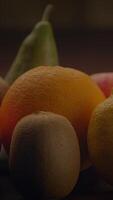 A Beautiful and Colorful Assortment of Fresh Fruits Arranged on a Wooden Surface video