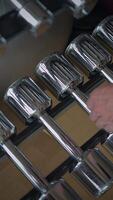 A Detailed CloseUp View of Shiny and Beautifully Polished Chrome Tools Displayed Neatly on a Rack video