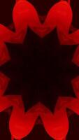 An Abstract Red Kaleidoscope Pattern is beautifully displayed against a strikingly Dark Background video