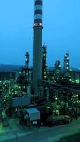 The Industrial Complex is illuminated at dusk, showcasing modern engineering and design video