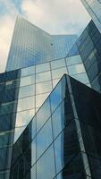 Incredibly Stunning Modern Glass Architecture Set Against an Overcast, Cloudy Sky Above video