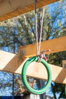 selective focus, detail of the rings of one of the obstacles of an obstacle course, ocr race photo