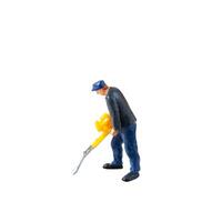 Miniature construction worker isolate on white background with clipping path photo