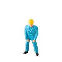 Miniature construction worker isolate on white background with clipping path photo
