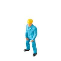 Miniature construction worker isolate on white background with clipping path photo