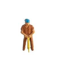 Miniature construction worker isolate on white background with clipping path photo