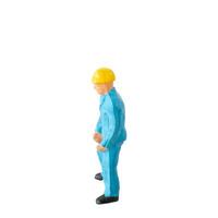 Miniature construction worker isolate on white background with clipping path photo