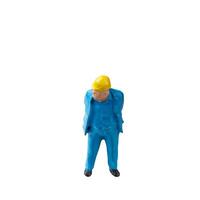 Miniature construction worker isolate on white background with clipping path photo