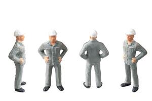 Miniature construction worker isolate on white background with clipping path photo