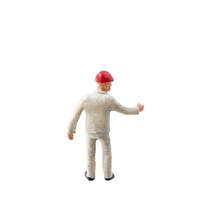Miniature construction worker isolate on white background with clipping path photo