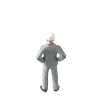 Miniature construction worker isolate on white background with clipping path photo