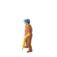 Miniature construction worker isolate on white background with clipping path photo