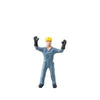 Miniature construction worker isolate on white background with clipping path photo