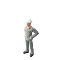 Miniature construction worker isolate on white background with clipping path photo