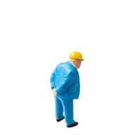 Miniature construction worker isolate on white background with clipping path photo