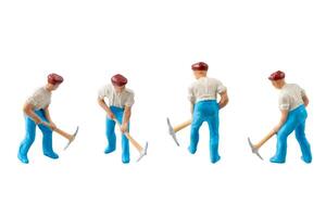 Miniature construction worker isolate on white background with clipping path photo