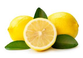 Front view of yellow lemon fruits with half and leaves in stack isolated on white background with clipping path photo