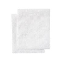 Top view of two folded white tissue paper in stack isolated on white background with clipping path photo