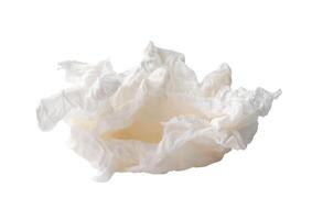 Side view of screwed or crumpled white tissue paper ball isolated on white background with clipping path photo