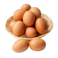 Top view of group of fresh brown chicken eggs in stack in wicker basket isolated on white background with clipping path. photo