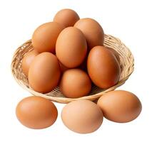 Top view of group of fresh brown chicken eggs in stack in wicker basket isolated on white background with clipping path photo