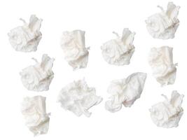 Top view set of screwed or crumpled white tissue paper ball isolated on white background with clipping path photo