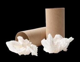 Side view of screwed or crumpled white tissue paper ball with cores in stack isolated on black background with clipping path photo