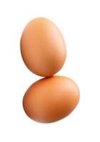 Top view of two fresh brown chicken eggs in stack isolated on white background with clipping path photo