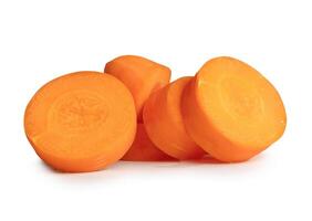 Front view of orange carrot slices or pieces in stack isolated on white background with clipping path photo