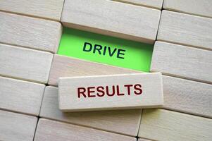 Top view of Drive Results text on wooden blocks. photo