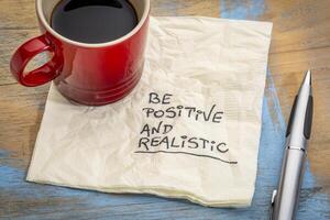 be positive and realistic photo