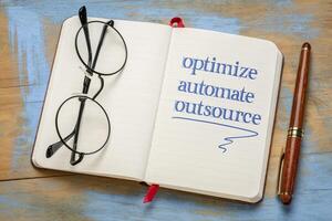 optimize, automate, outsource - business concept photo