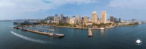 Aerial View of San Diego Skyline with USS Midway and Coronado Bridge photo
