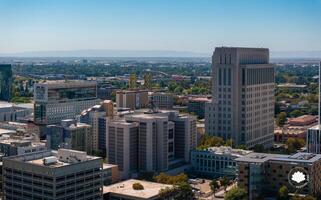 Aerial View of Sacramento Featuring Tower Bridge and Ziggurat Building photo