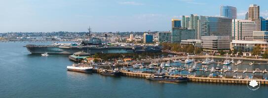Aerial View of USS Midway Museum and San Diego Skyline photo