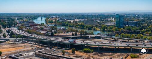 Aerial View of Sacramento with Tower Bridge and Ziggurat Building photo