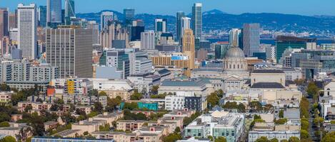 Aerial View of San Francisco City Hall and Diverse Urban Skyline photo